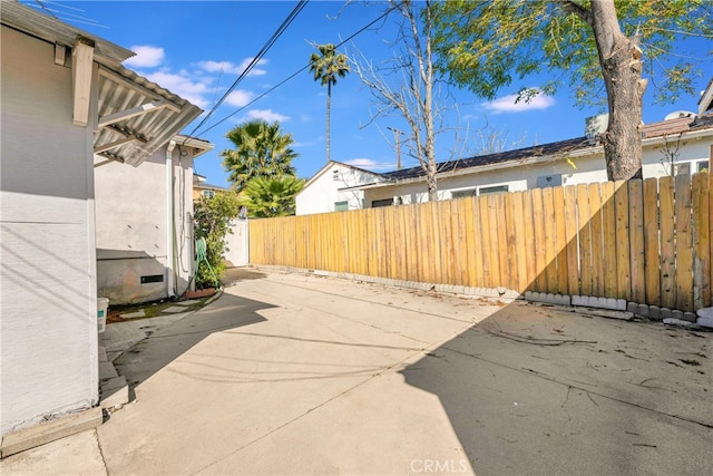 exterior space featuring fence