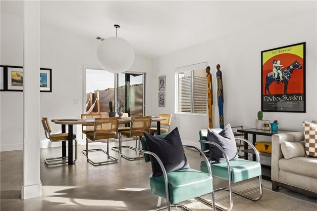 living room with finished concrete flooring