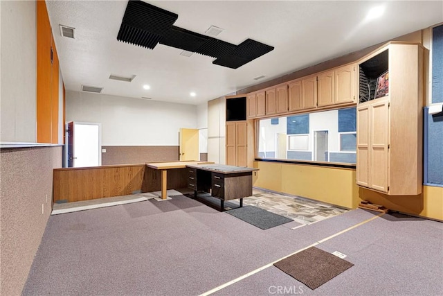 carpeted office featuring recessed lighting and visible vents