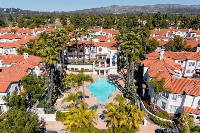 aerial view with a mountain view and a residential view