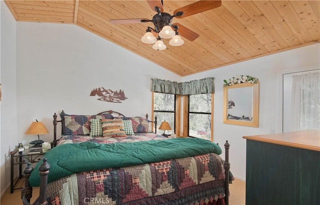 bedroom with lofted ceiling, wood ceiling, carpet, and baseboards