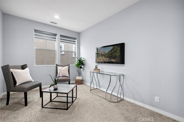 sitting room featuring visible vents, recessed lighting, carpet flooring, and baseboards