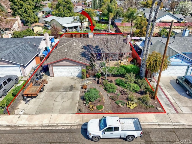 birds eye view of property with a residential view