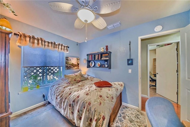 bedroom with visible vents, ceiling fan, and baseboards