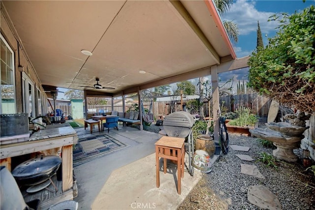 view of patio featuring a ceiling fan and a fenced backyard