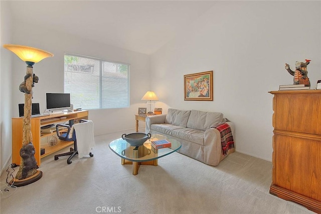 living room with vaulted ceiling and carpet