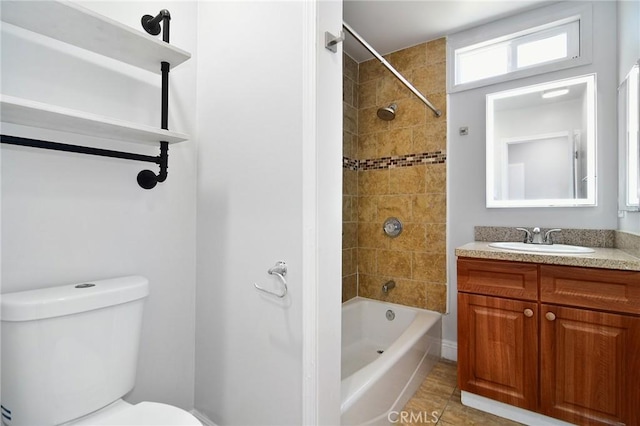 full bathroom featuring tile patterned floors, shower / bath combination, toilet, and vanity