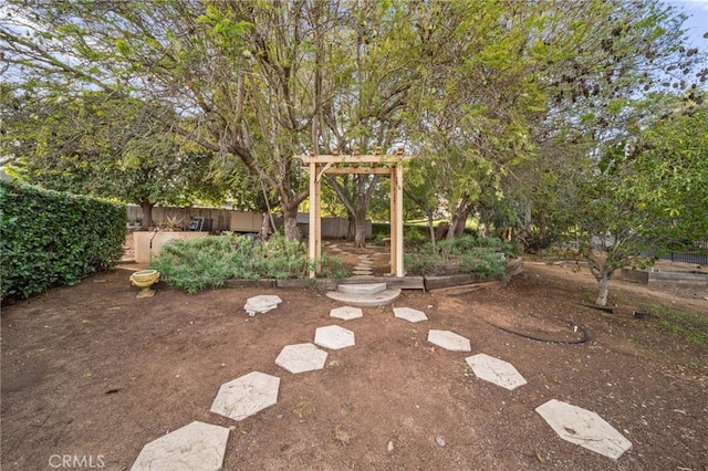 view of yard with fence