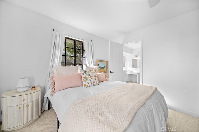 bedroom featuring light carpet