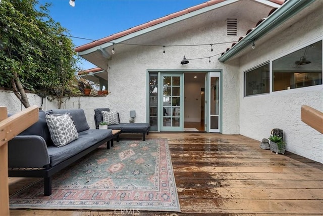 deck with outdoor lounge area