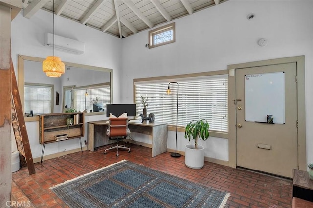 office with high vaulted ceiling, beam ceiling, brick floor, an AC wall unit, and wooden ceiling