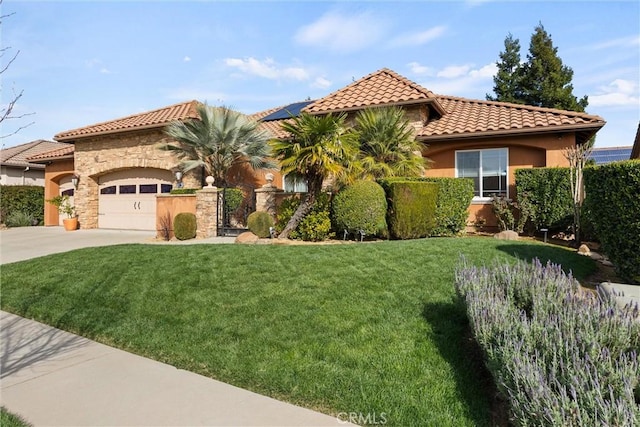 mediterranean / spanish-style house featuring a front yard, an attached garage, stucco siding, concrete driveway, and a tile roof