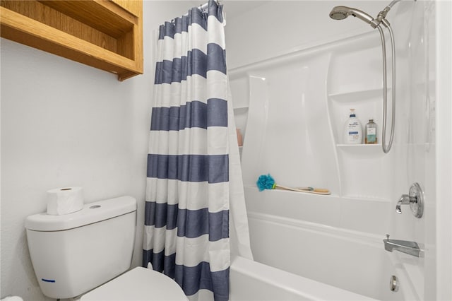 full bath with shower / bath combo with shower curtain and toilet