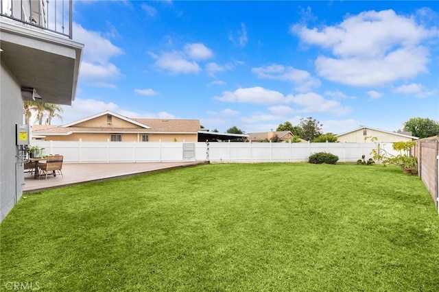 view of yard with a fenced backyard and a patio area