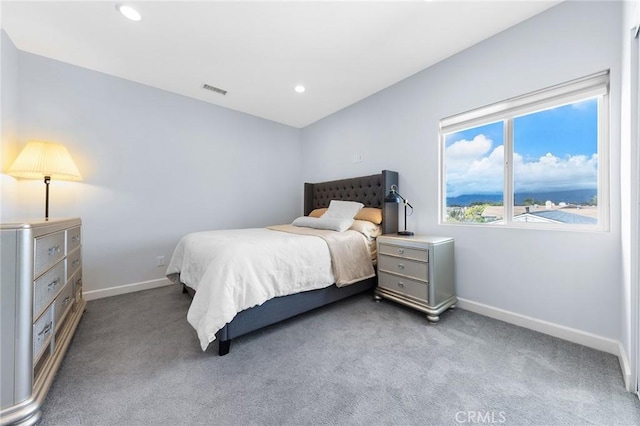 carpeted bedroom with recessed lighting, visible vents, and baseboards