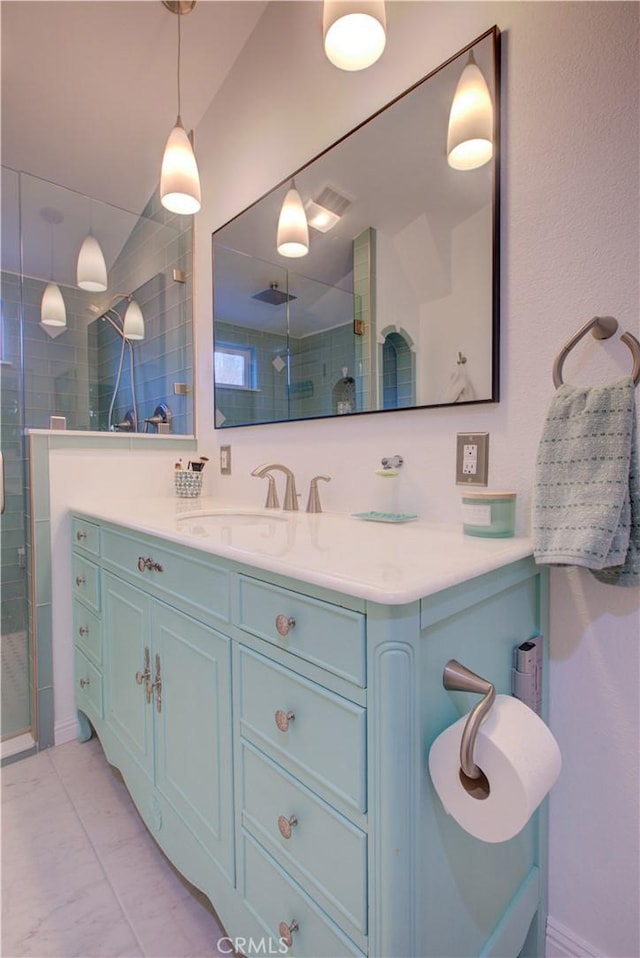 full bath featuring vanity and a stall shower