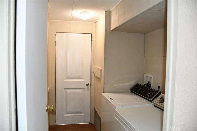 laundry area featuring independent washer and dryer and laundry area