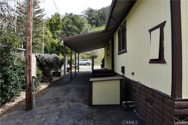 view of patio featuring a carport