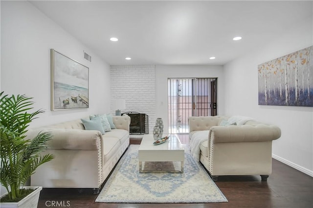 living room with recessed lighting, baseboards, visible vents, and dark wood-style flooring