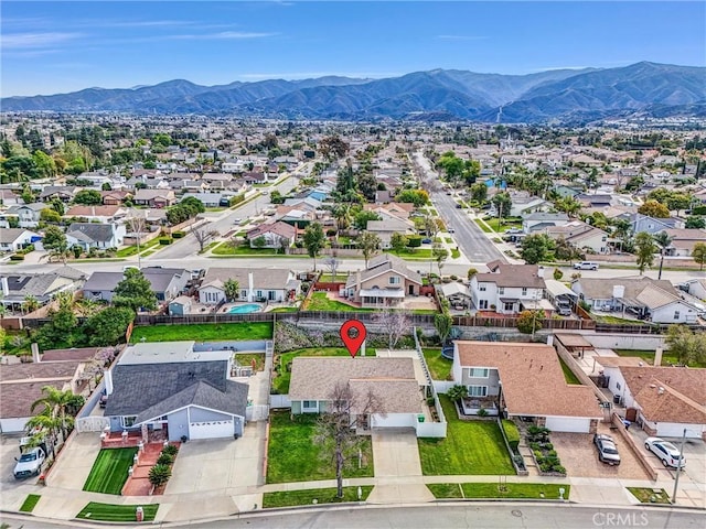 bird's eye view with a mountain view and a residential view