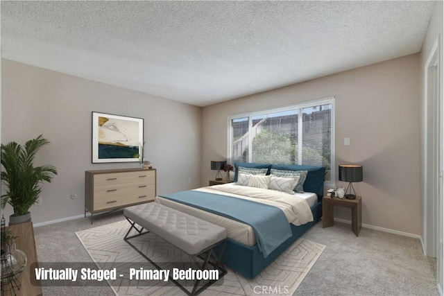 bedroom featuring baseboards, light carpet, and a textured ceiling