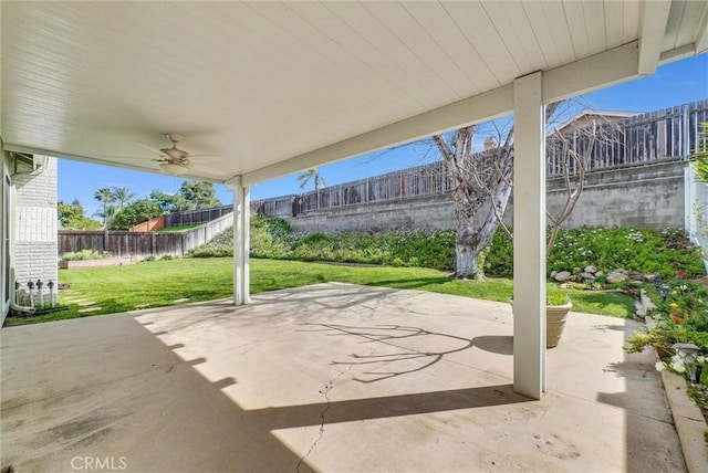 view of patio / terrace with a fenced backyard and ceiling fan