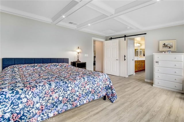 bedroom featuring visible vents, beamed ceiling, a barn door, wood finished floors, and coffered ceiling