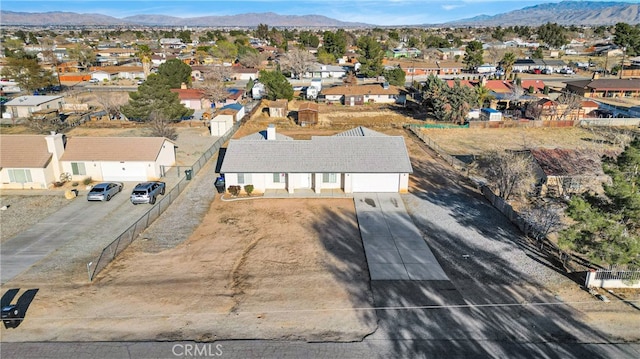 aerial view with a mountain view and a residential view