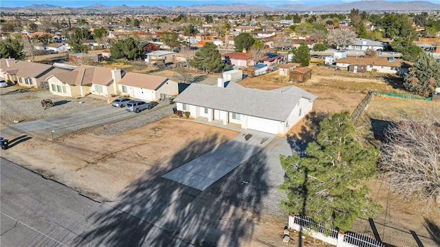 aerial view with a residential view and a mountain view