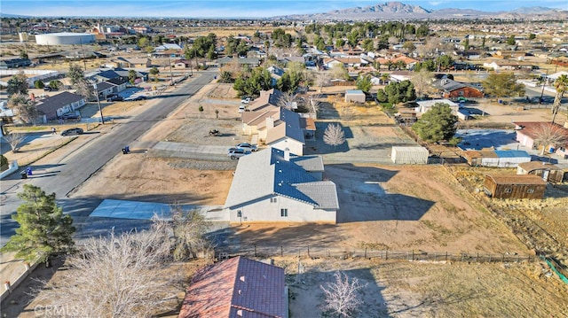 drone / aerial view featuring a mountain view and a residential view