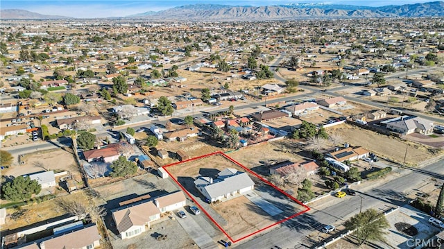 birds eye view of property featuring a residential view and a mountain view