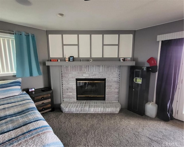 carpeted living room featuring a fireplace