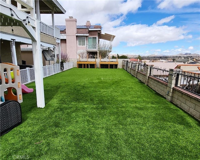 view of yard with a fenced backyard