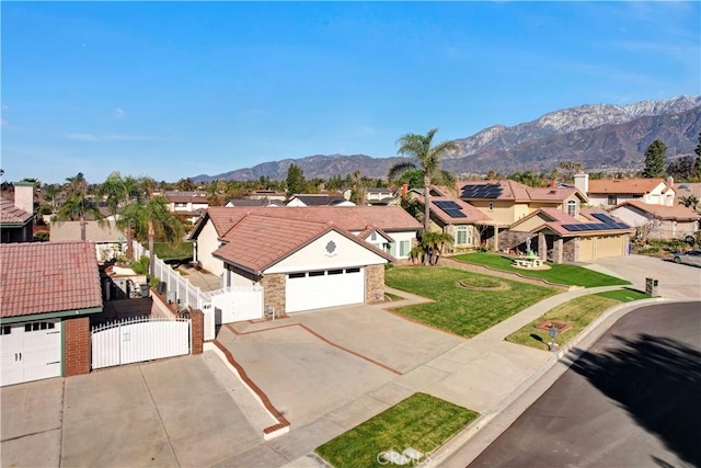 exterior space with a residential view and a mountain view