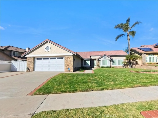 view of front of home featuring a front yard, fence, stucco siding, concrete driveway, and a garage