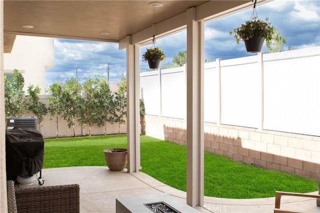 view of patio / terrace featuring area for grilling and a fenced backyard