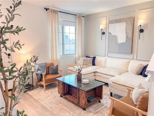 living area featuring light wood-style flooring