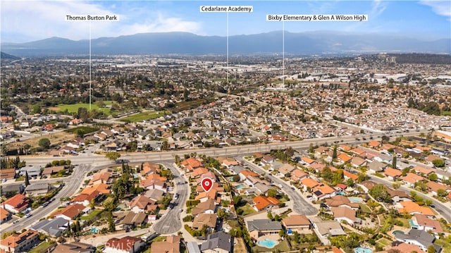 bird's eye view featuring a mountain view and a residential view