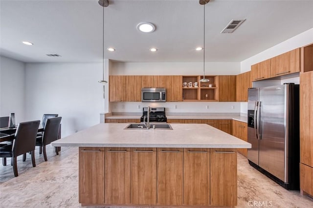 kitchen with visible vents, light countertops, appliances with stainless steel finishes, brown cabinetry, and open shelves