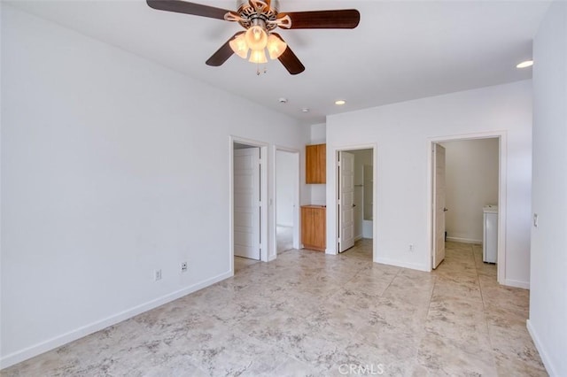 unfurnished bedroom featuring baseboards, washer / clothes dryer, recessed lighting, ensuite bathroom, and a walk in closet