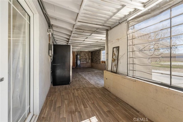 hallway with wood finished floors