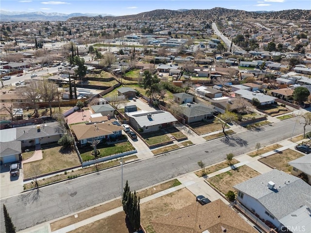 aerial view featuring a mountain view and a residential view