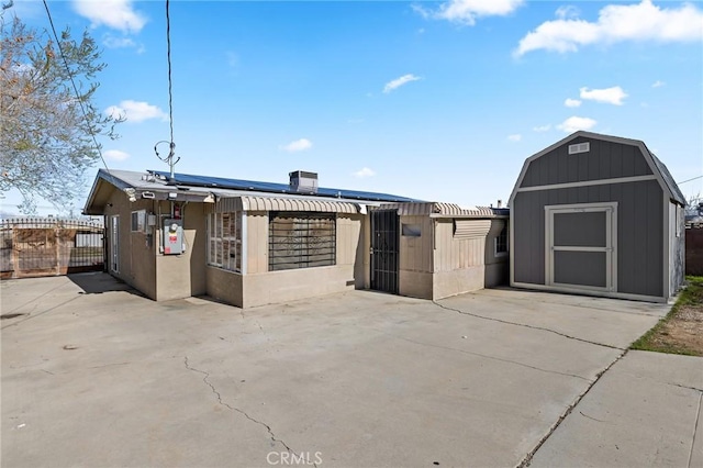 exterior space with a gate and fence