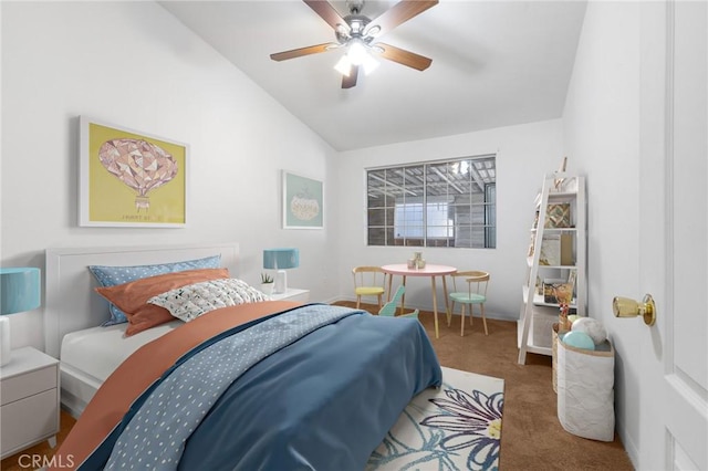 bedroom with carpet floors, ceiling fan, and vaulted ceiling