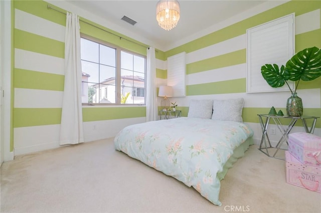 bedroom with a notable chandelier, visible vents, carpet flooring, and baseboards