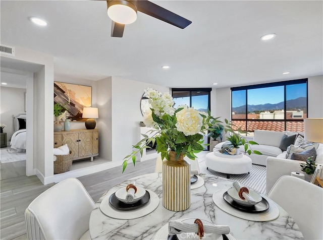 dining room featuring recessed lighting, ceiling fan, visible vents, and baseboards