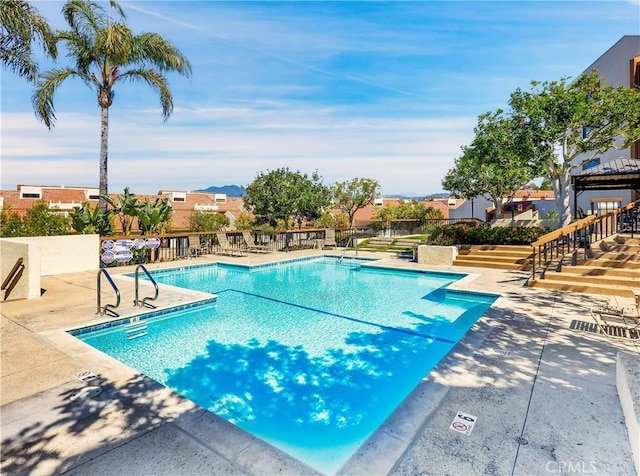 pool with a patio