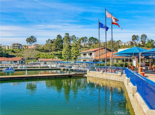 dock area featuring a water view