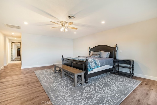 bedroom featuring visible vents, recessed lighting, baseboards, and light wood-style floors