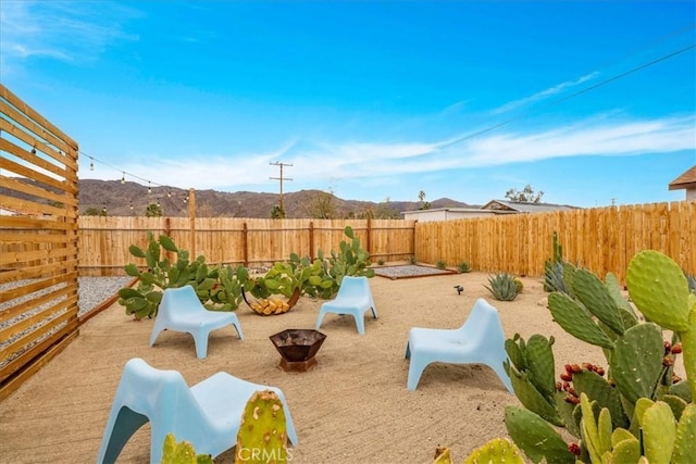 exterior space with a patio area and a fenced backyard